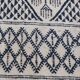 Traditional white and blue hand-woven wool carpet