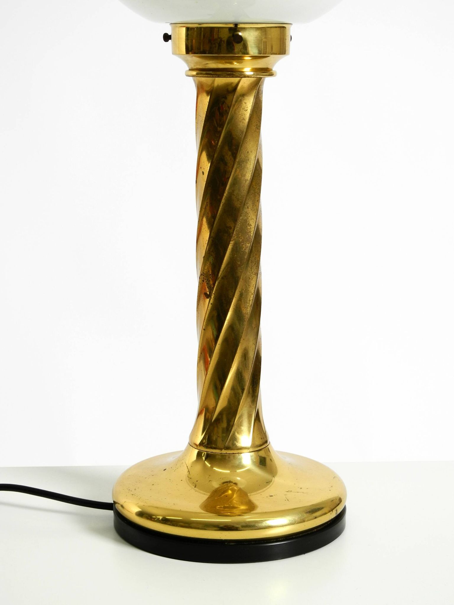 Large 1960s brass column-style table lamp with frosted glass globe
