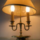 Directoire style bouillotte lamp in brass with double lights.