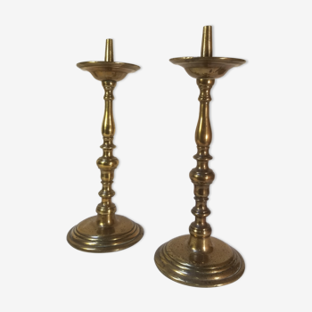 Pair of ancient candle holders in gilded bronze - height 31 cm