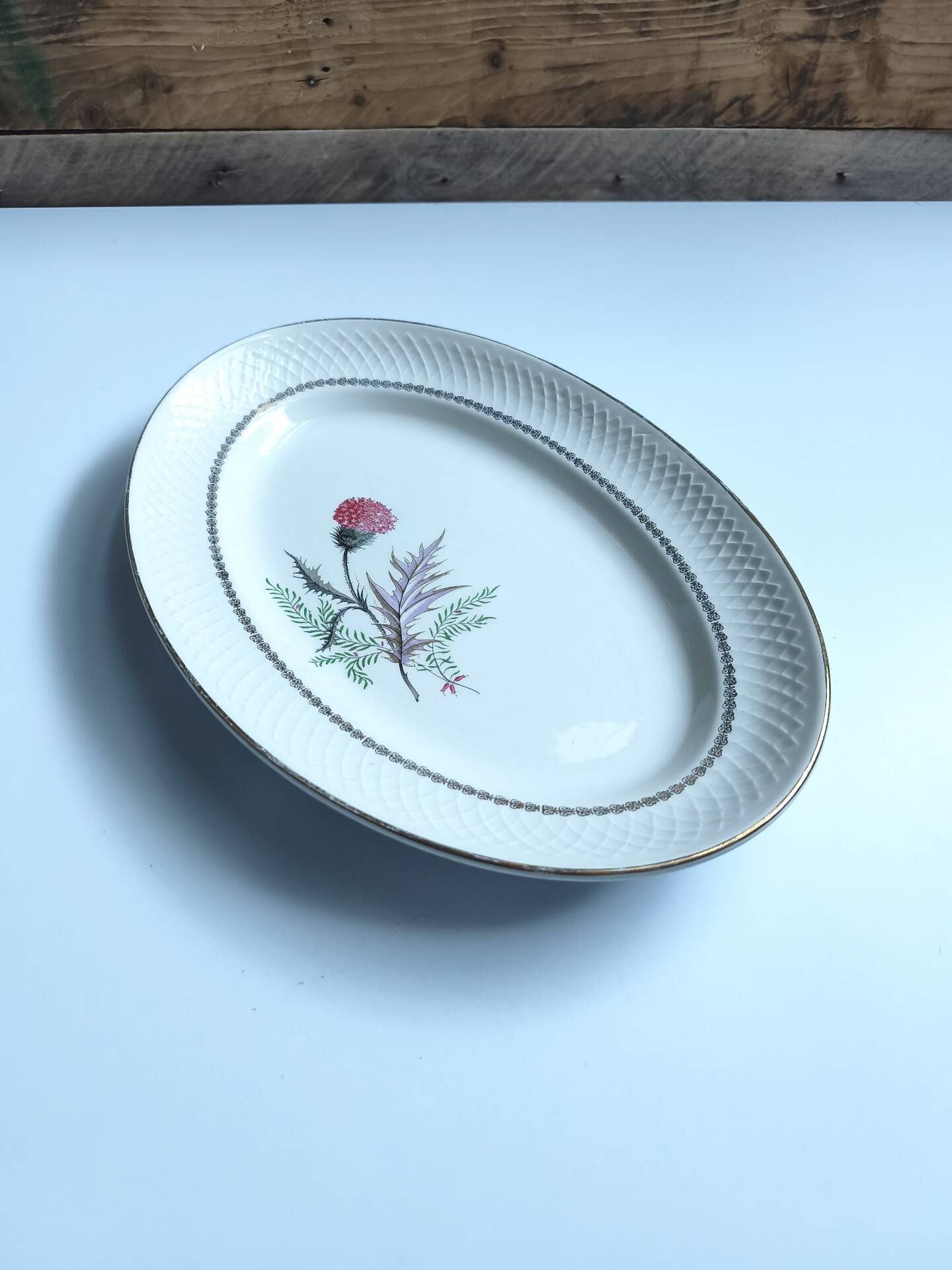 Vintage oval plate signed Moulin des Loups model Imperia pink flower