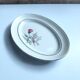 Vintage oval plate signed Moulin des Loups model Imperia pink flower