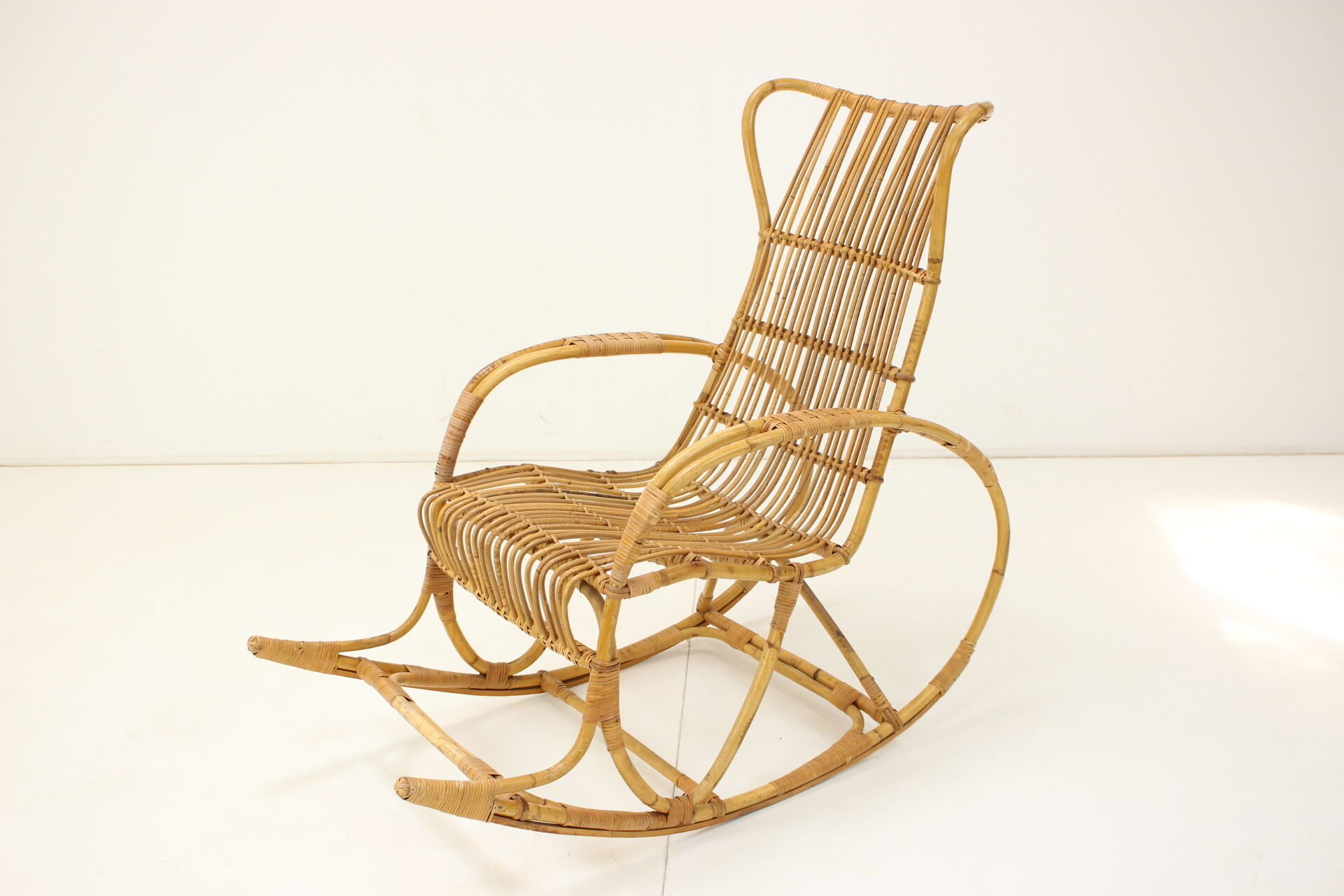 Mid-century rattan rocking chairs, 1960's