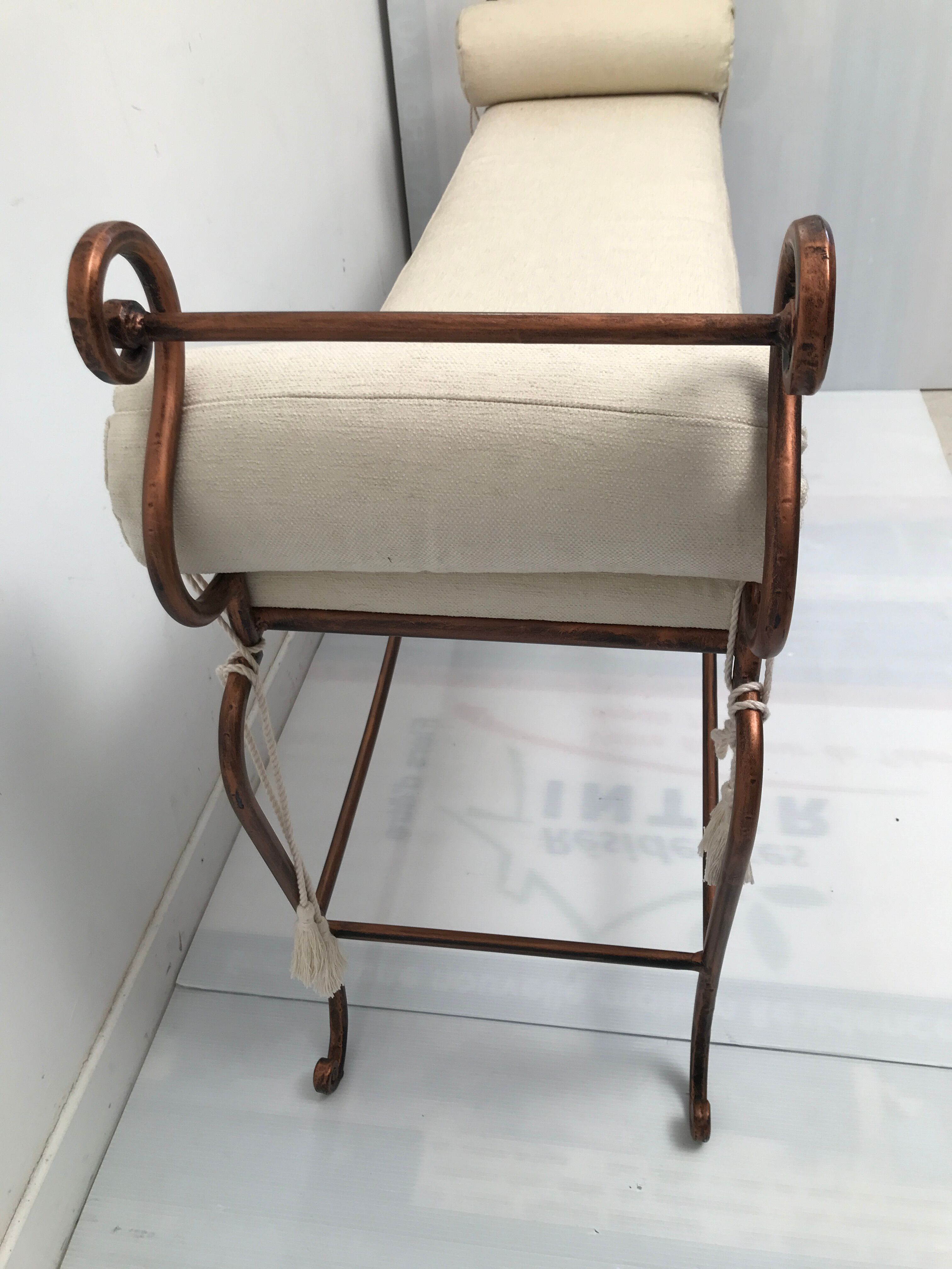 Copper wrought iron bench with cushions