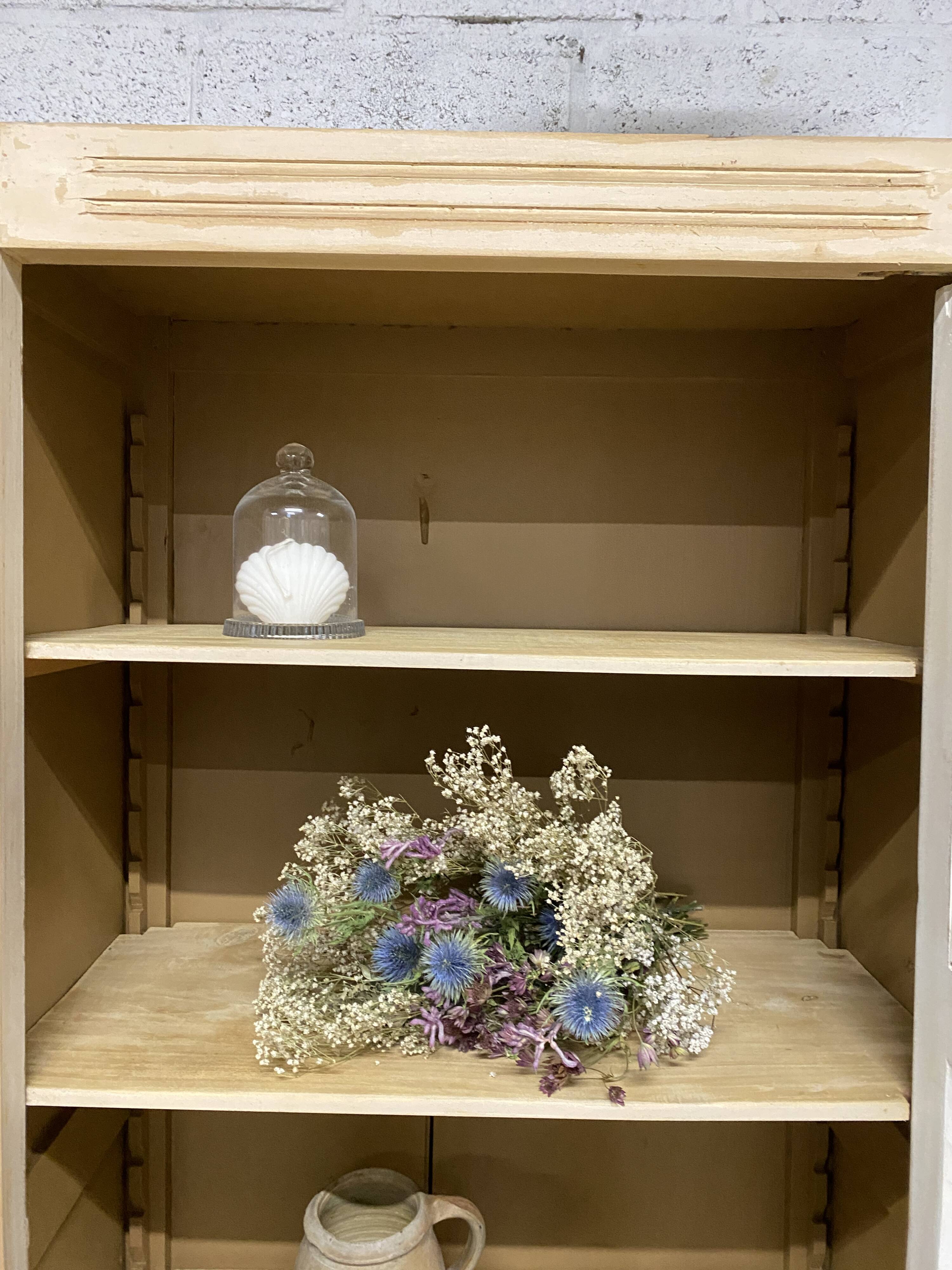 Glass-fronted Parisian wardrobe