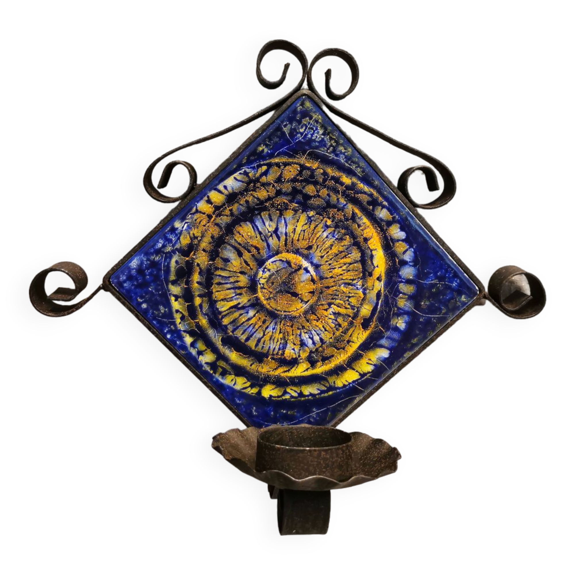 Wall-mounted candle holder in cast iron and ceramic. Estimated Danish and from the 70s.