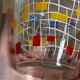 Vintage carafe and its 3 graphic style liqueur glasses.