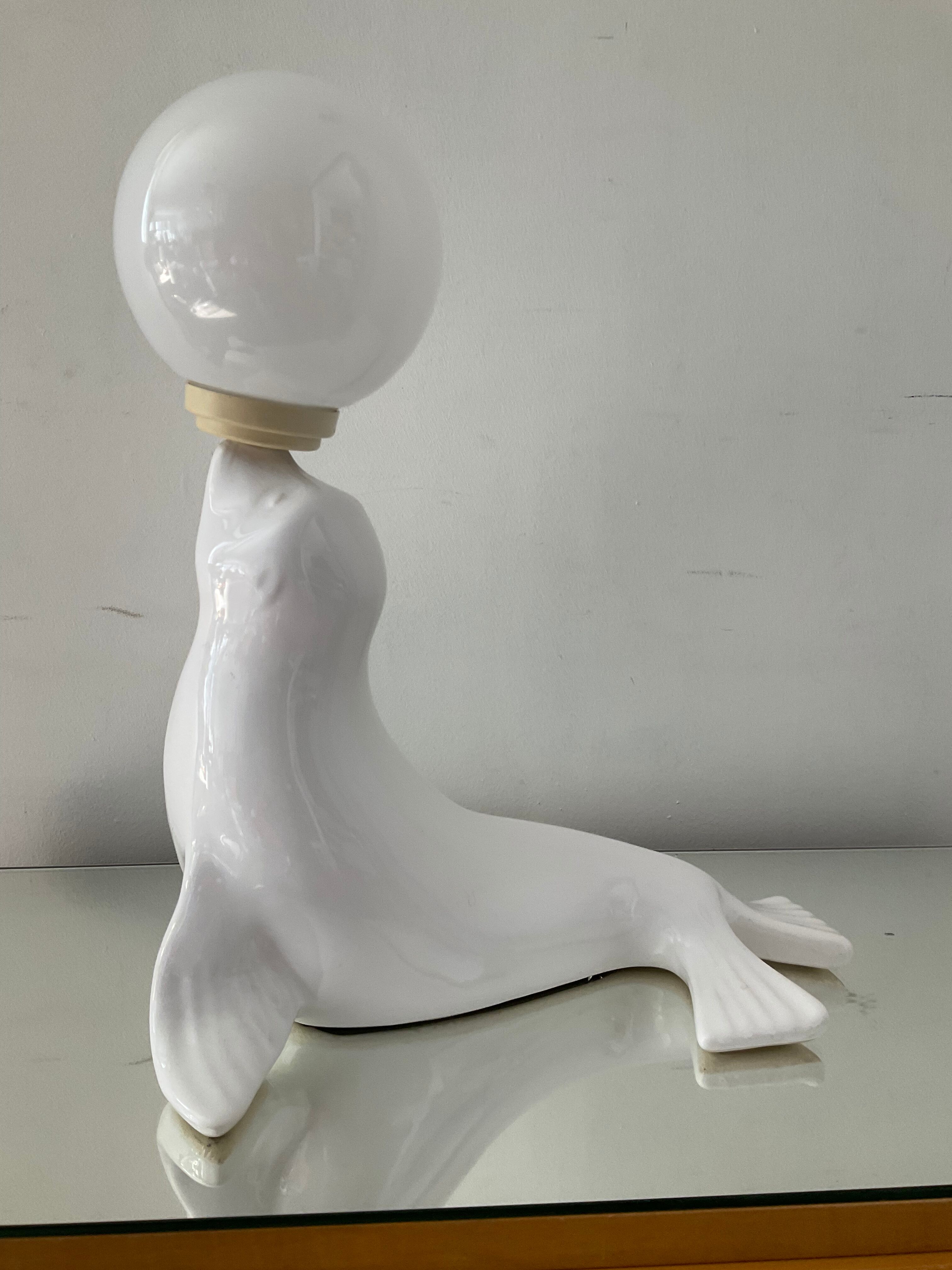 Vintage sea lion lamp in ceramic and opaline