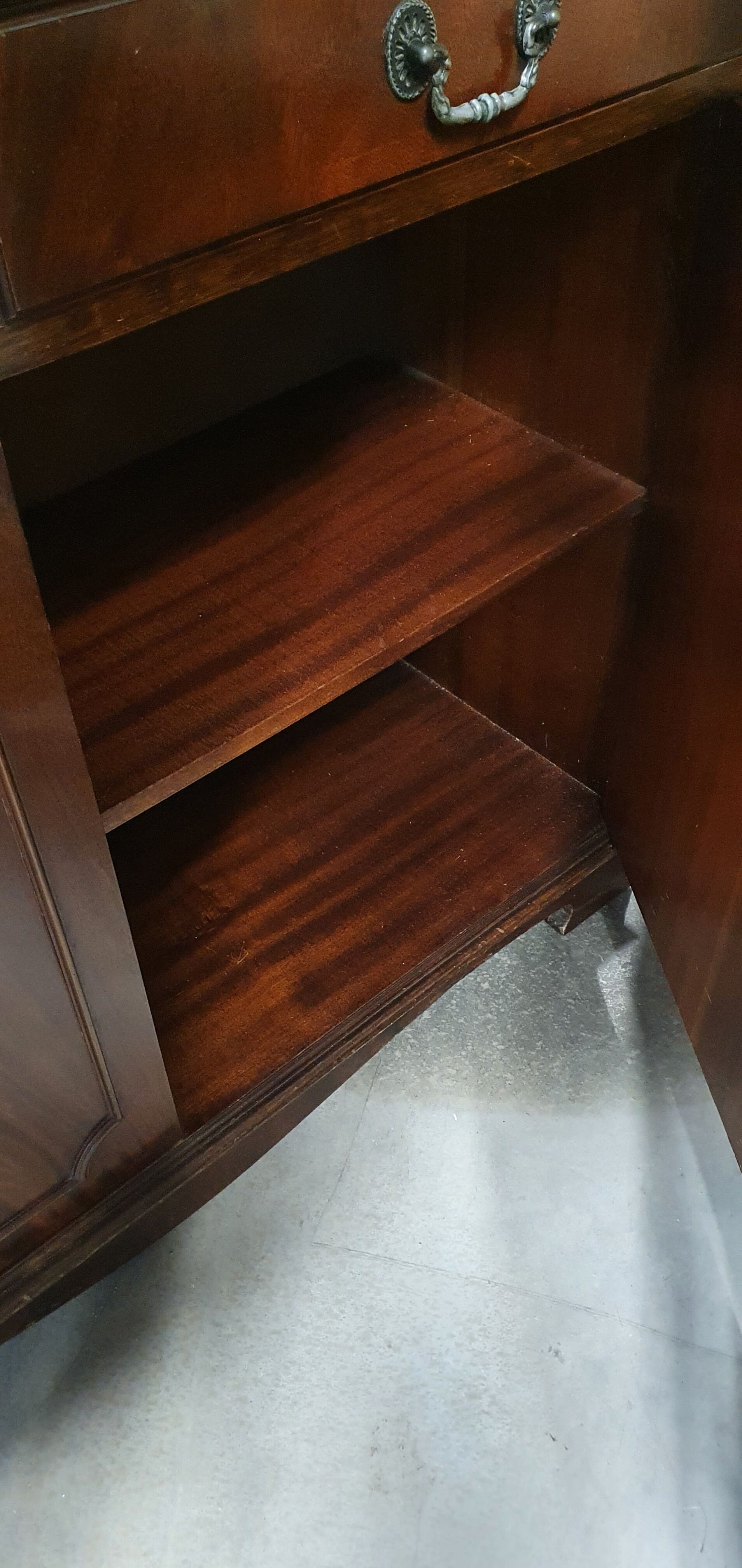 English showcase, two bodies, solid mahogany an of the 50s