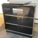 Vintage black and gold TV cabinet from the 70s/80s