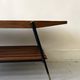 Mid-century coffee table with 2 mahogany wood tops and brass detail, Italy.