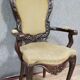 Fauteuil de bureau galbé de style Louis XV en acajou sculpté vers 1850