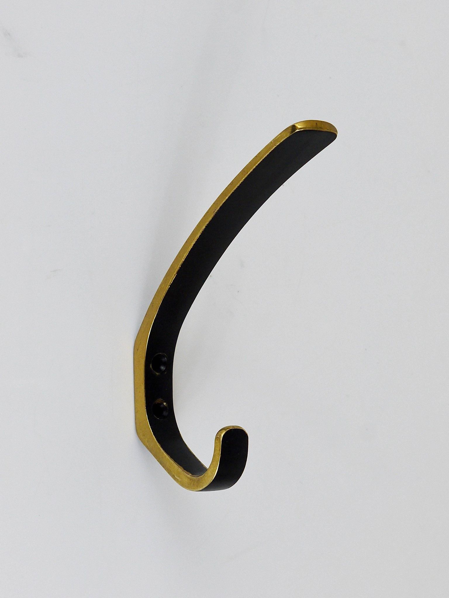 Up to 2 mid-century brass wall hooks by Hertha Baller, Austria, 1950s.