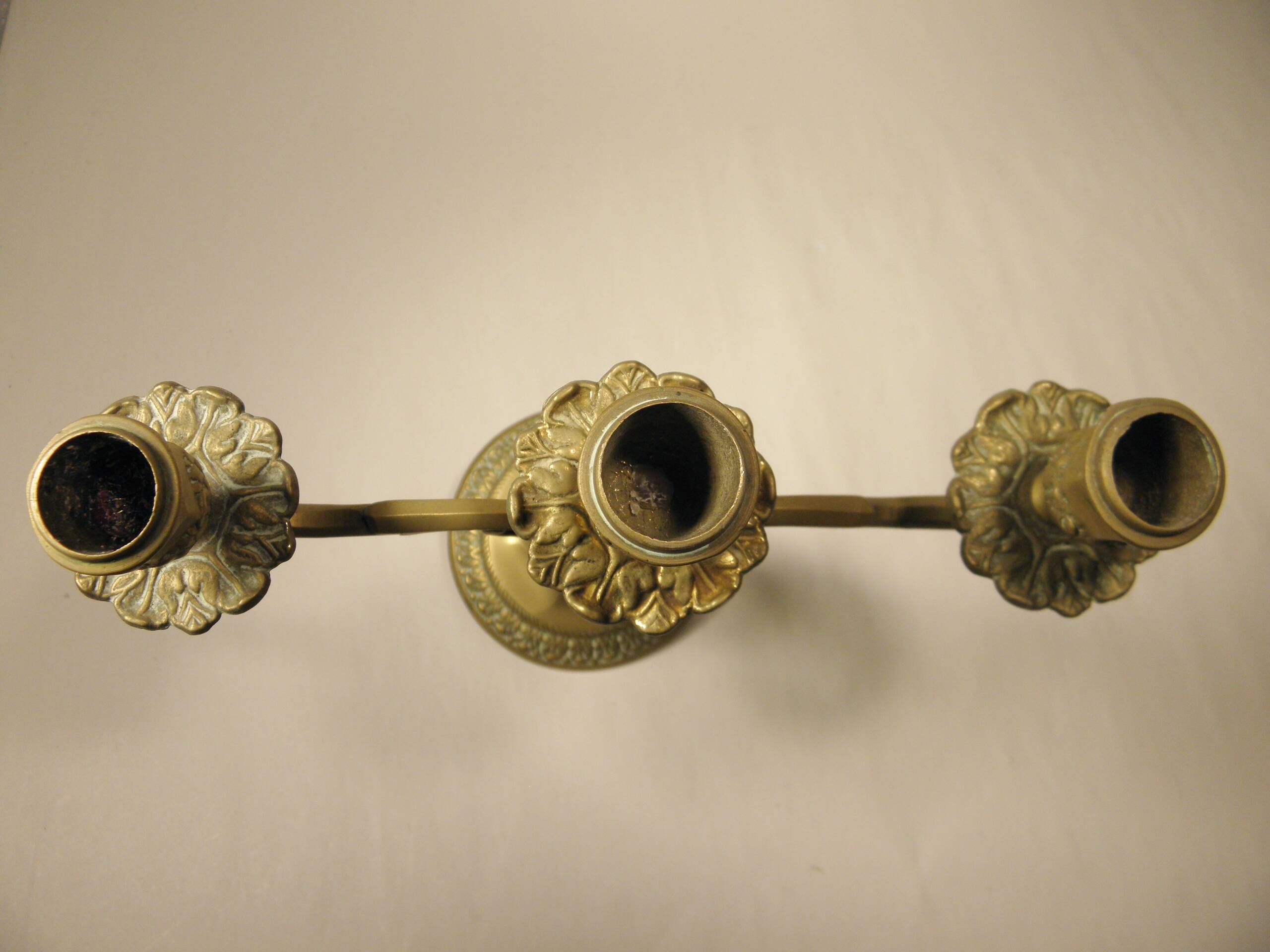 Three-light brass candlestick