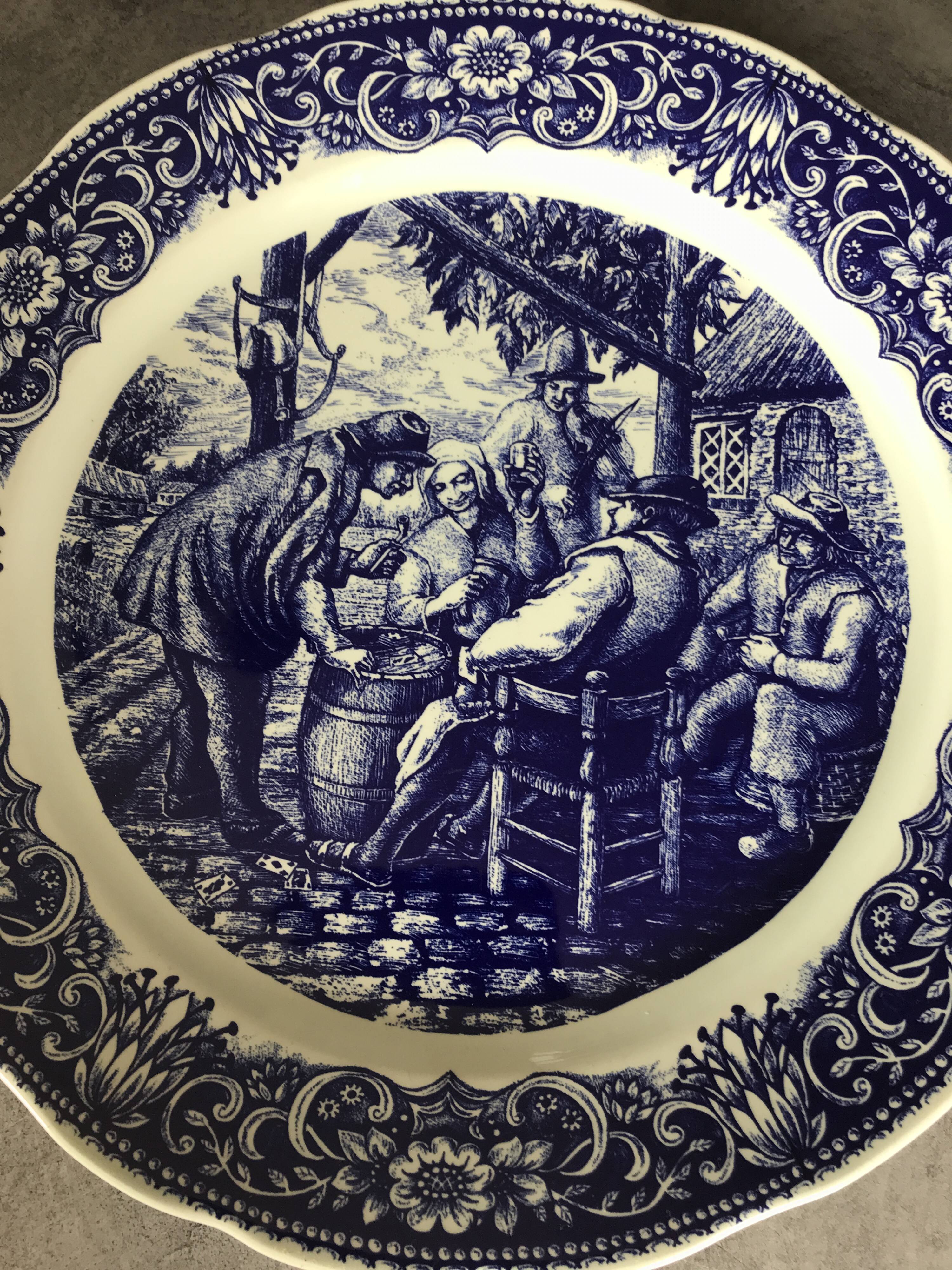 Blue enamelled earthenware wall dish with peasant scene decor Boch La Louvière