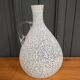 Pitcher vase in the shape of a gourd 1940 gray speckled on a white background