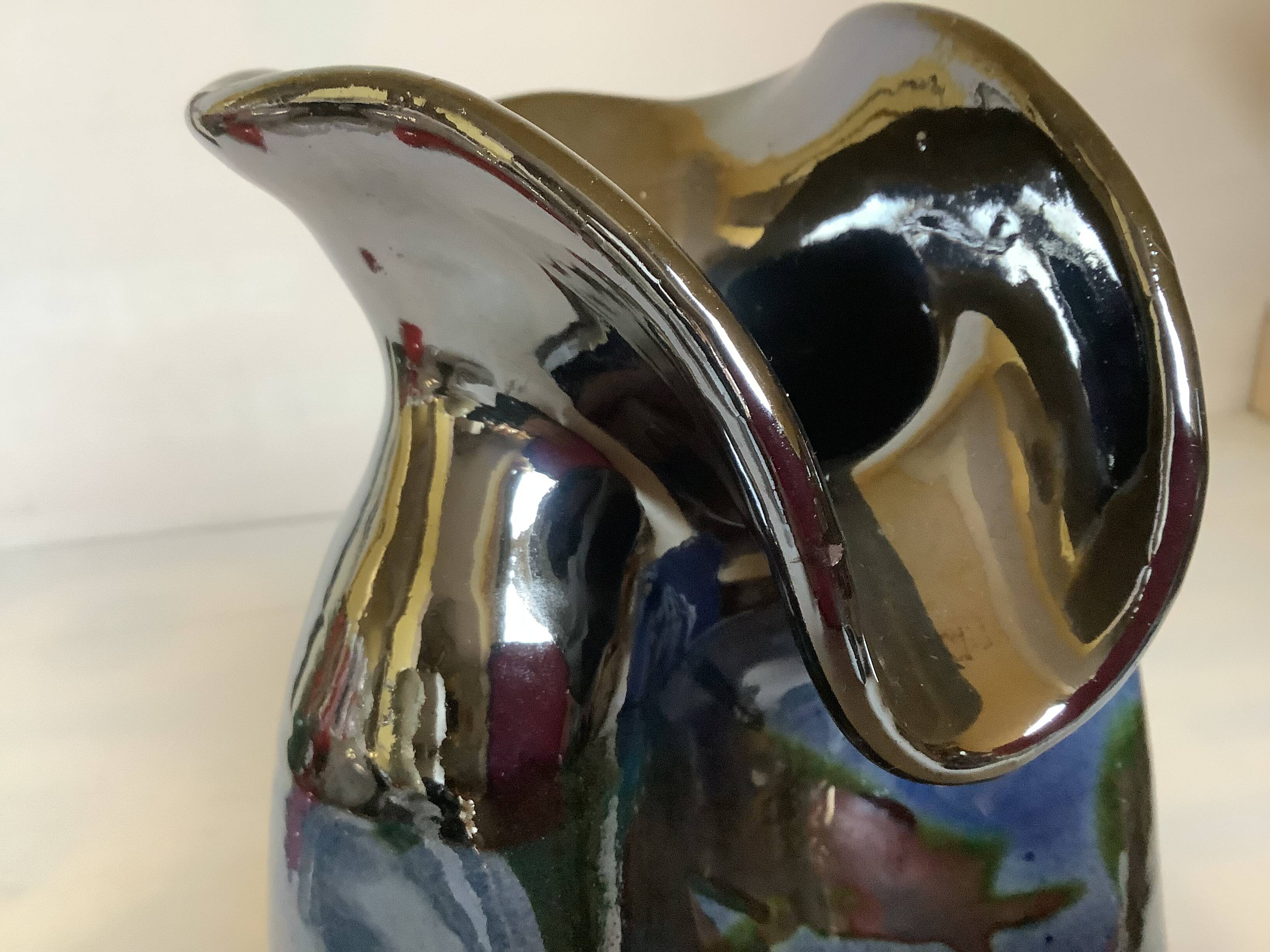 Iridescent modernist vase by Thomas Buxo