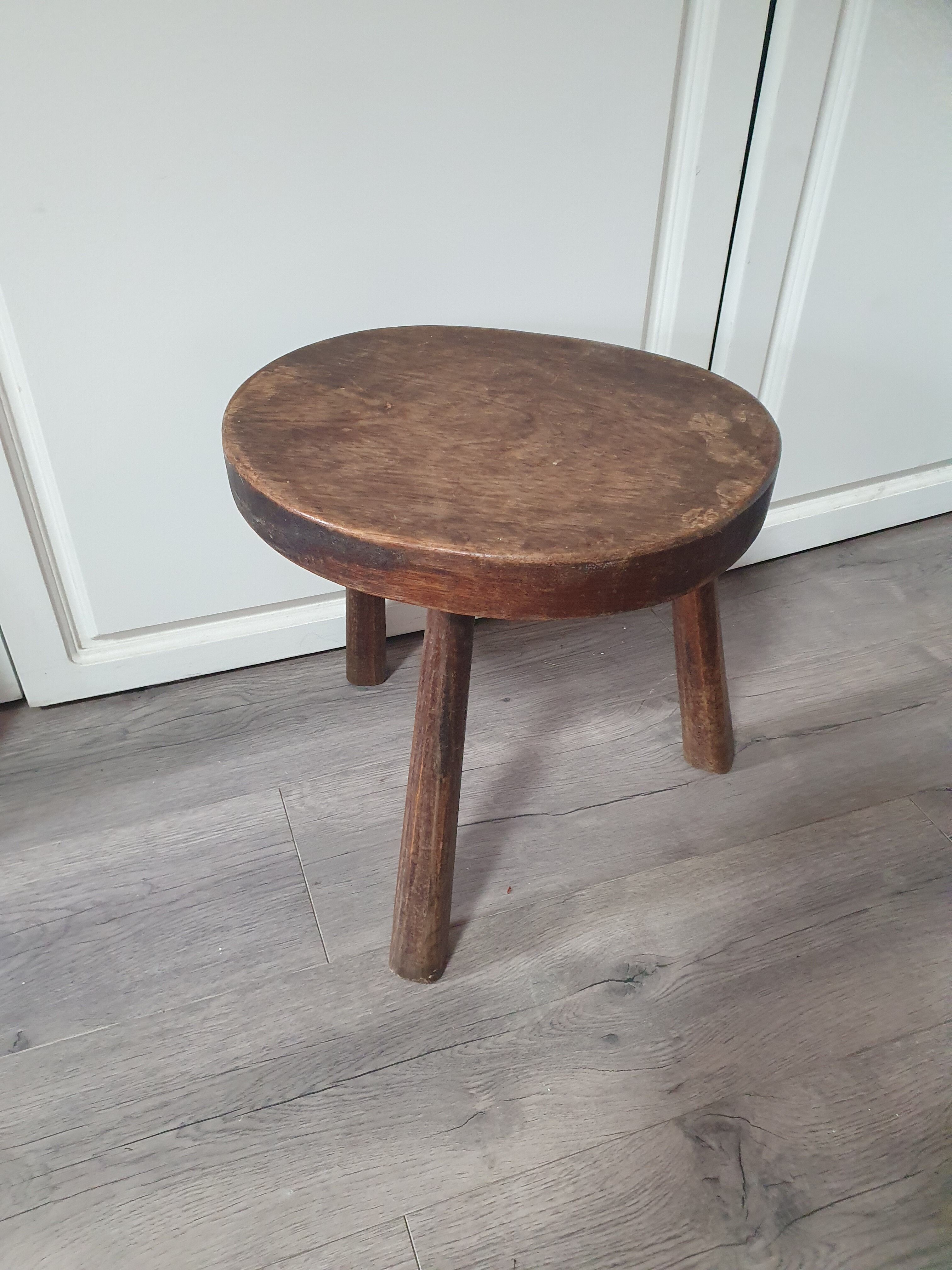 Vintage old wooden stool tripod