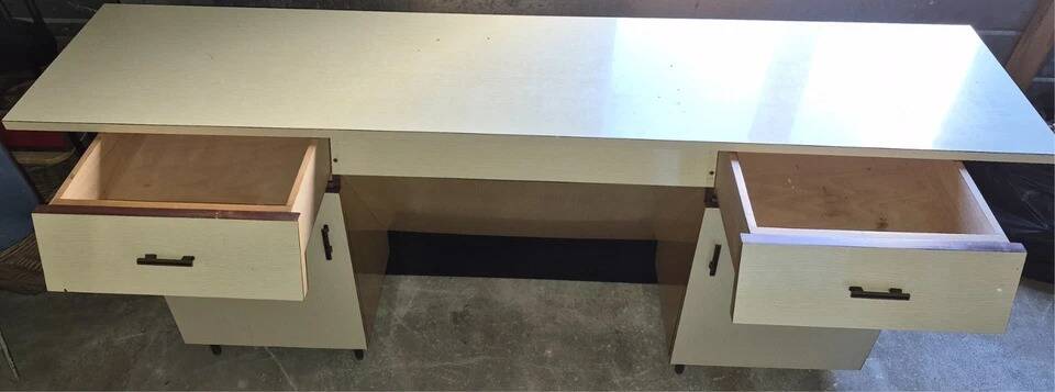 Modernist desk in formica, work from the 1950s.