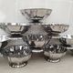 10 stainless steel dessert / ice cream bowls in Guy Degrenne style, flower shape.