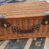 Picnic basket with white porcelain crockery