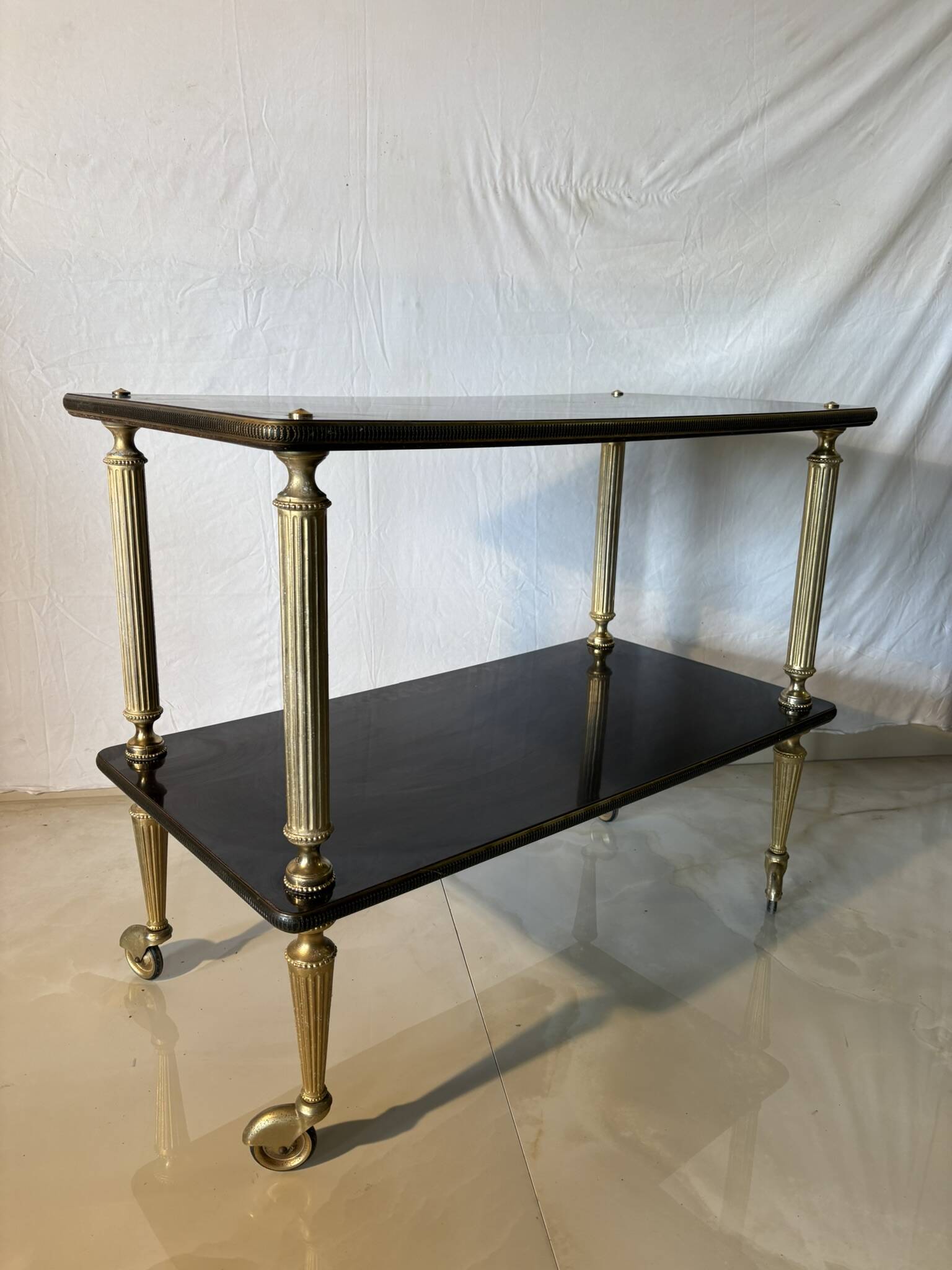 Vintage trolley on wheels, black wood and brass uprights