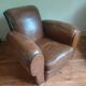 Club armchair, patinated leather
