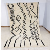 Handmade moroccan berber carpet 277 x 150 cm