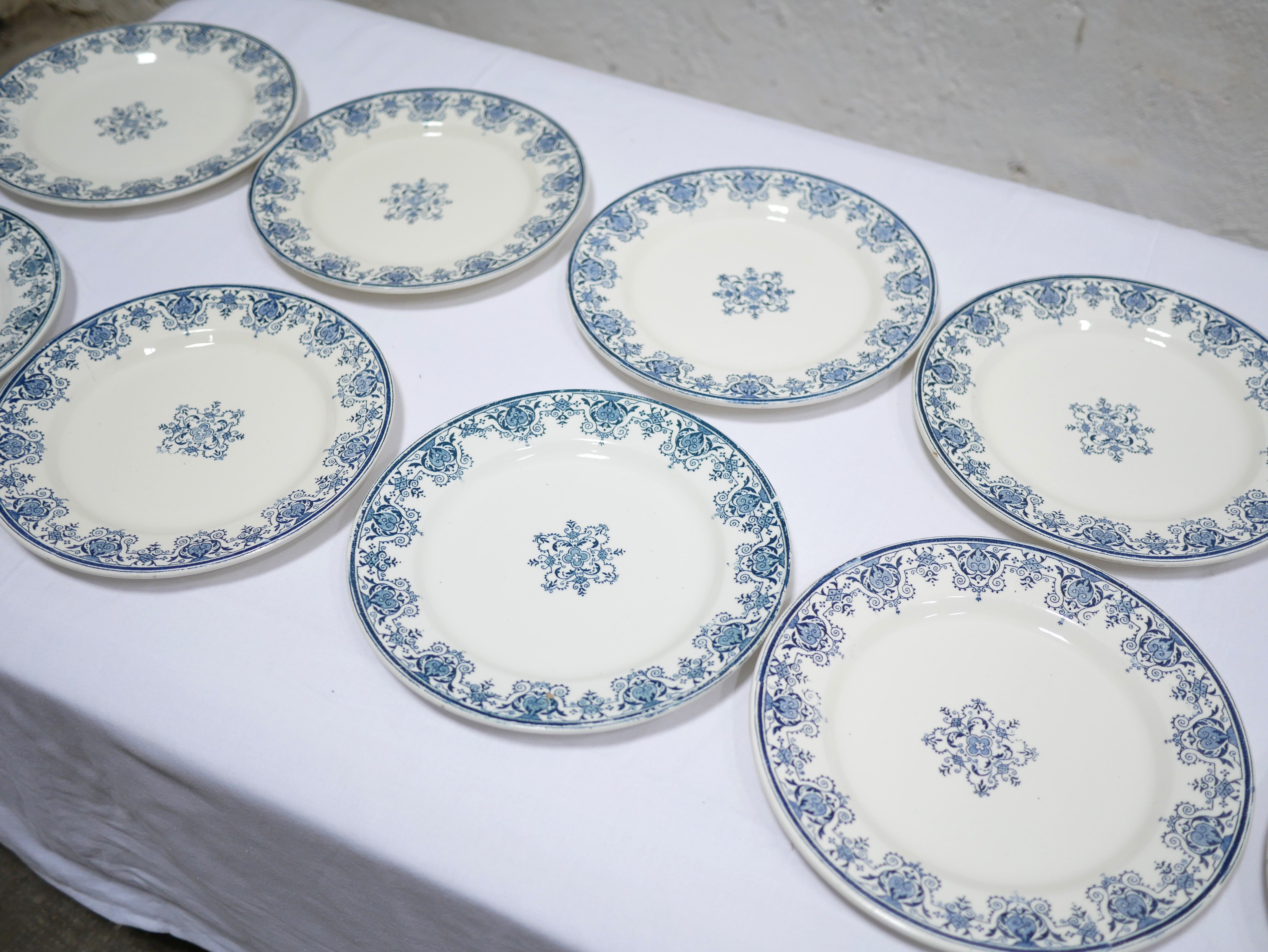 Series of 10 old Terre de Fer plates by L.G. for the earthenware factory of Clairefontaine