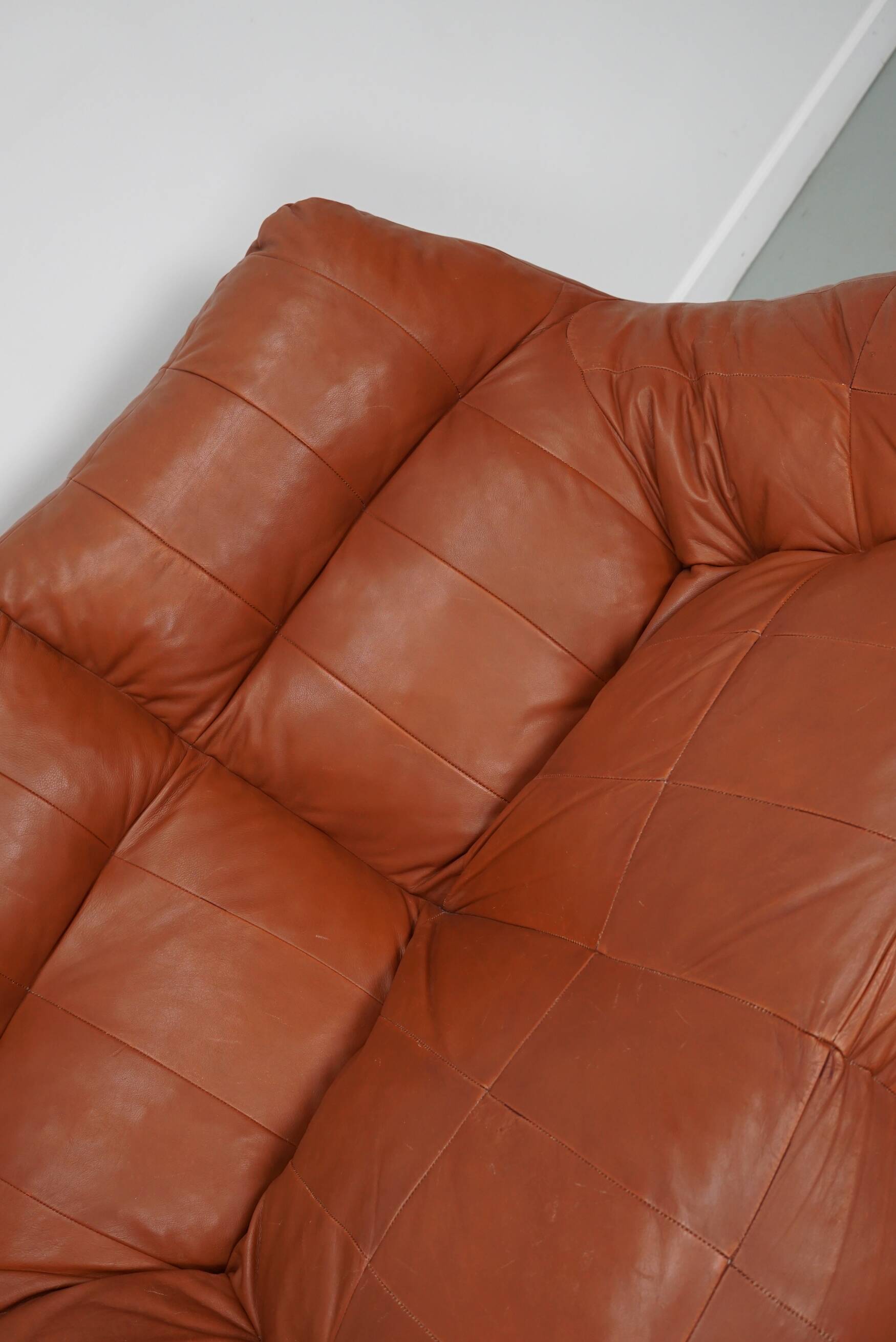 Pouf / Canapé 2 places en cuir patchwork vintage