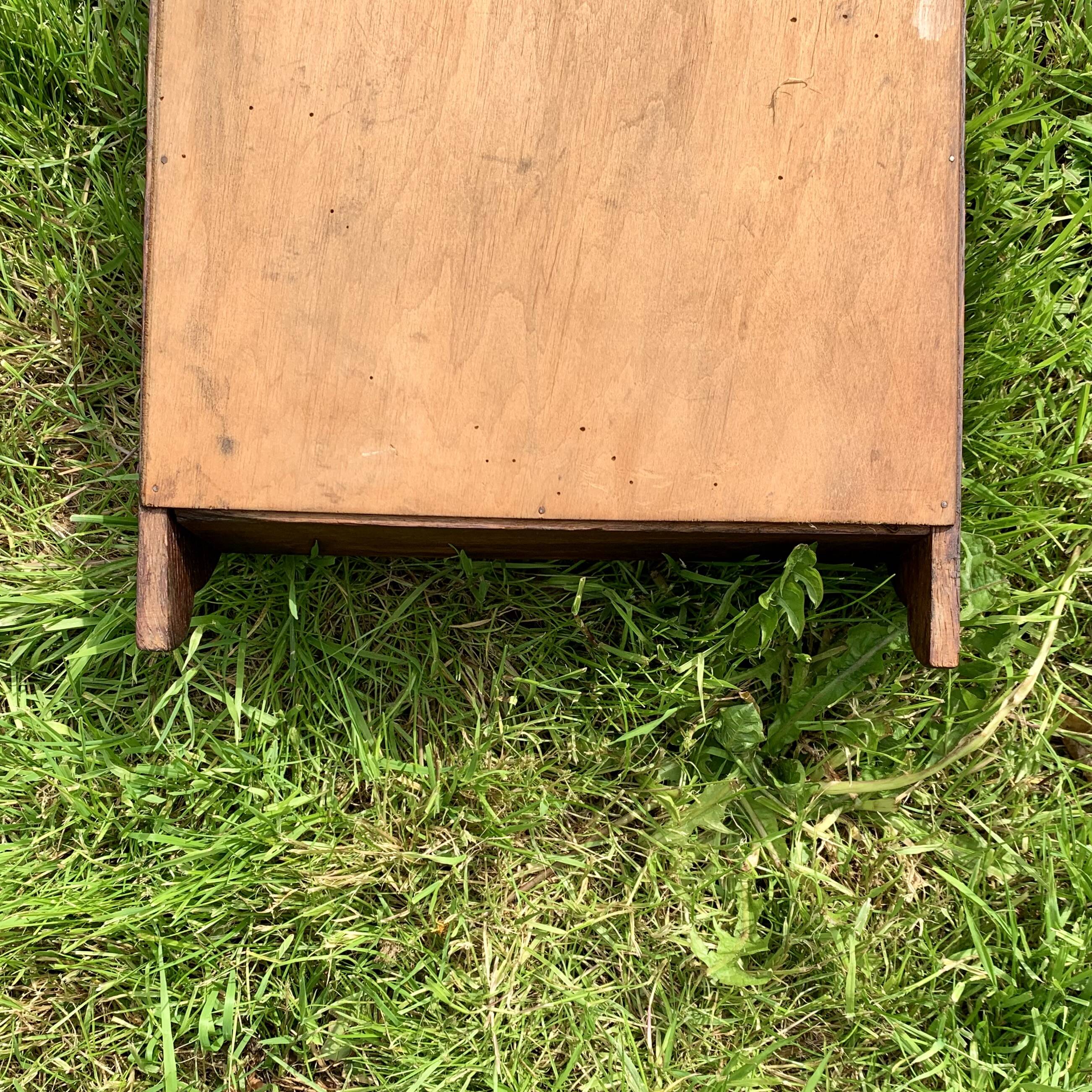 Old carved wooden medicine cabinet with beveled mirror