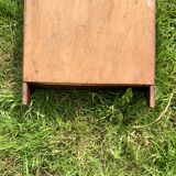 Old carved wooden medicine cabinet with beveled mirror