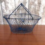 Old foldable blue metal basket, vintage handles