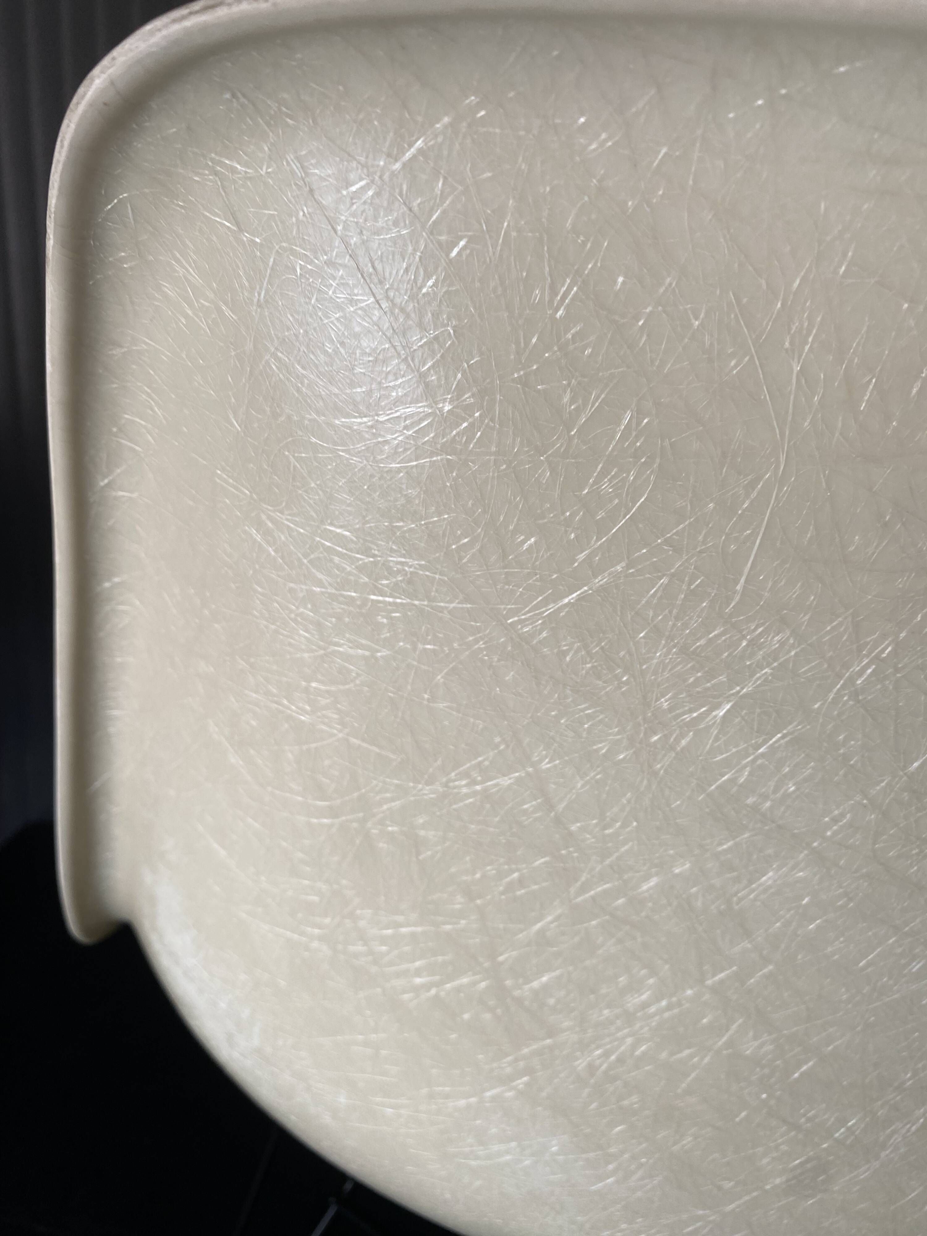 Eames lounge chair white fibre parchment base cat’s cradle Herman Miller