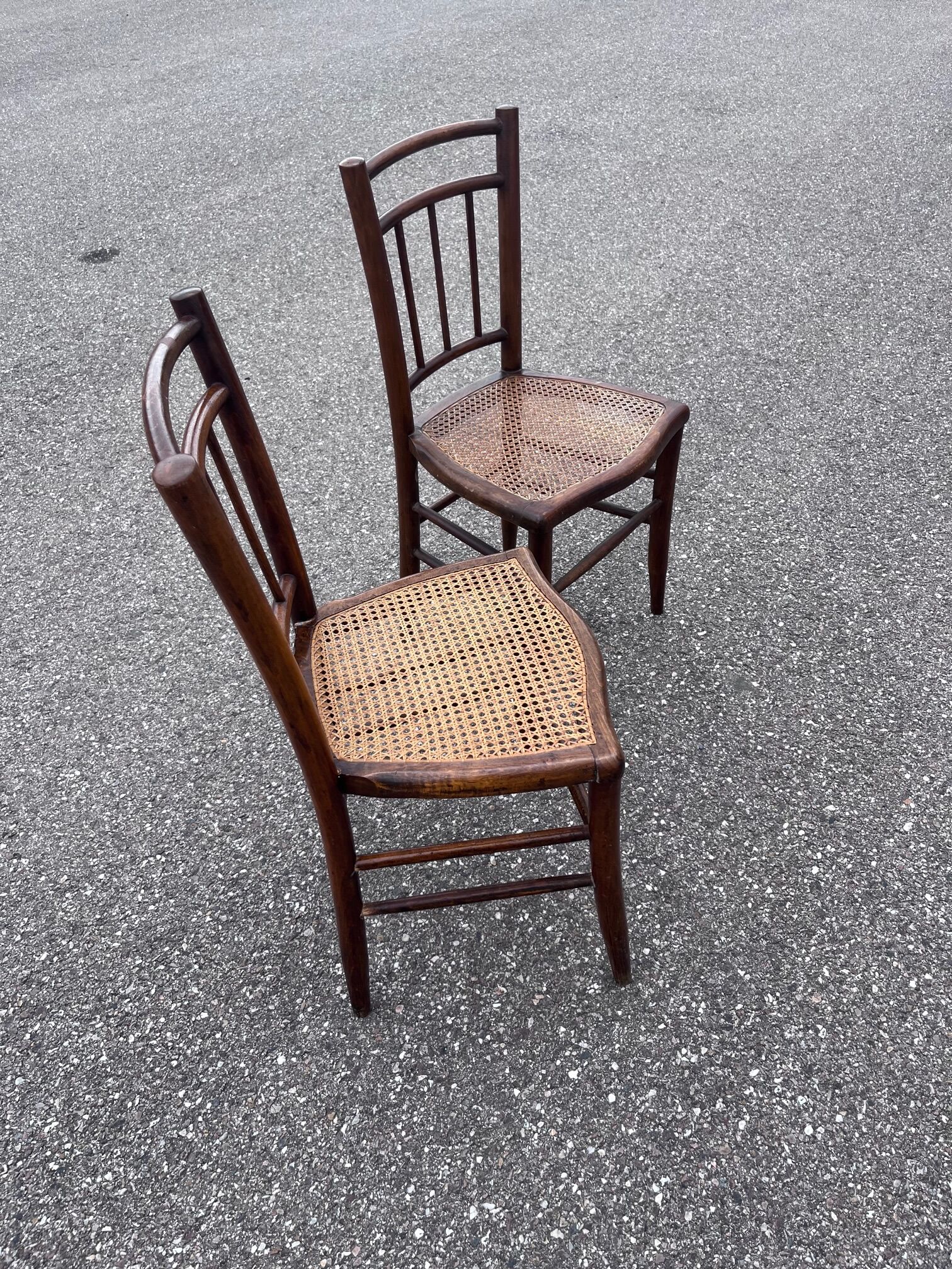 Pair of canned bistro chairs