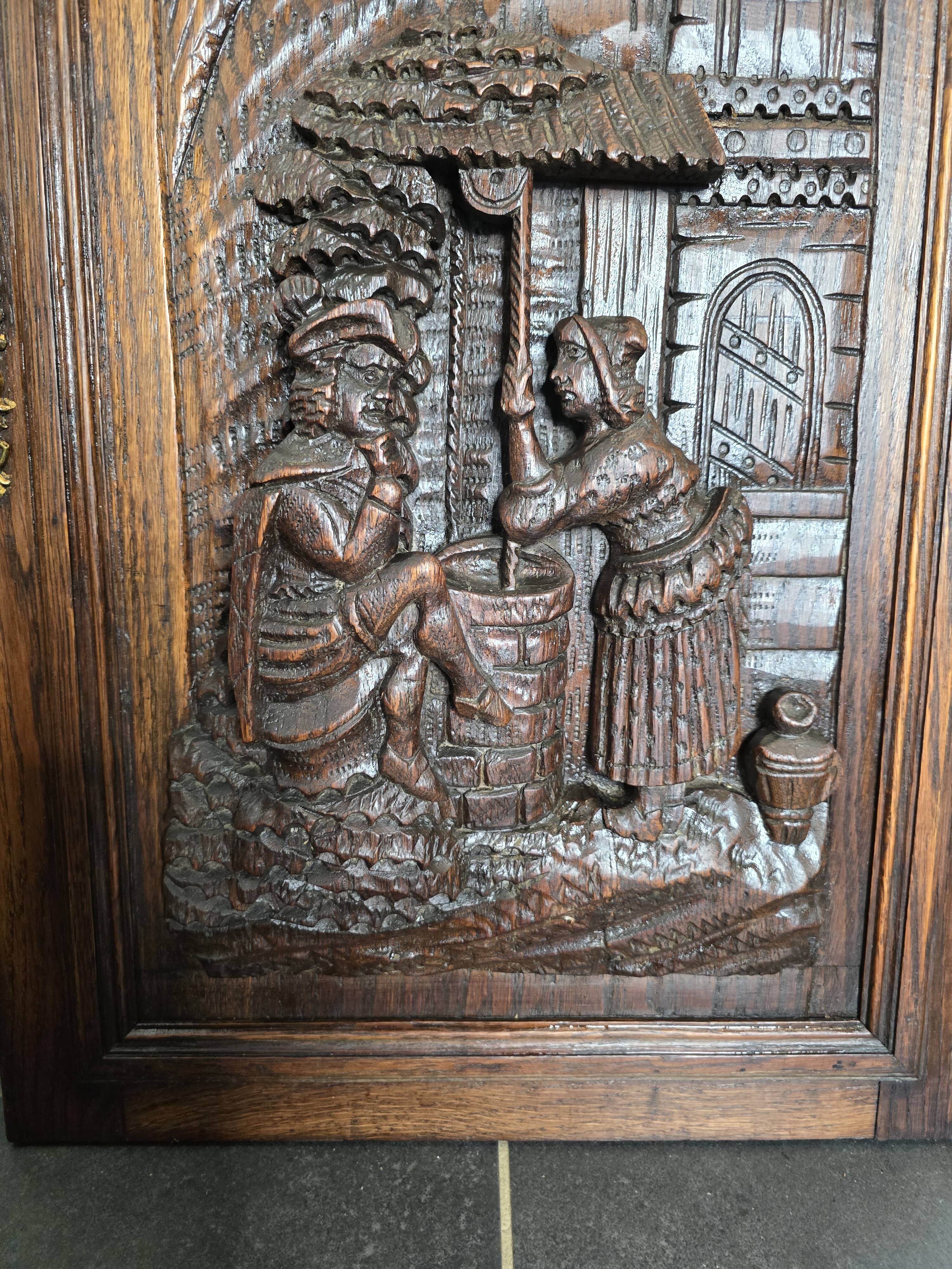 Old wooden door carved from oak