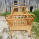 Former cradle bed baby rotin curved on vintage 60s roulettes