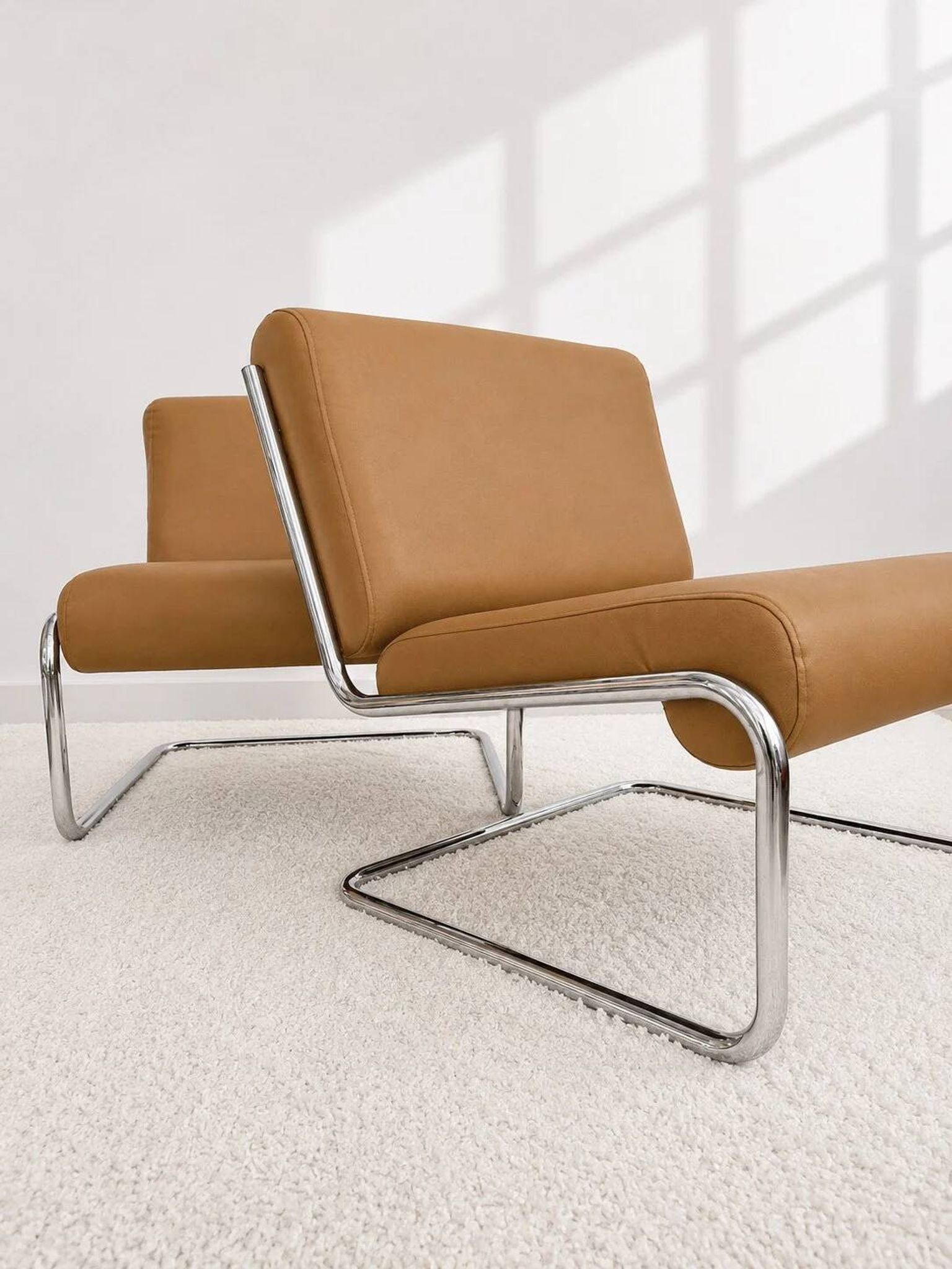 Vintage cantilever armchair. Brown faux leather upholstery. 60s