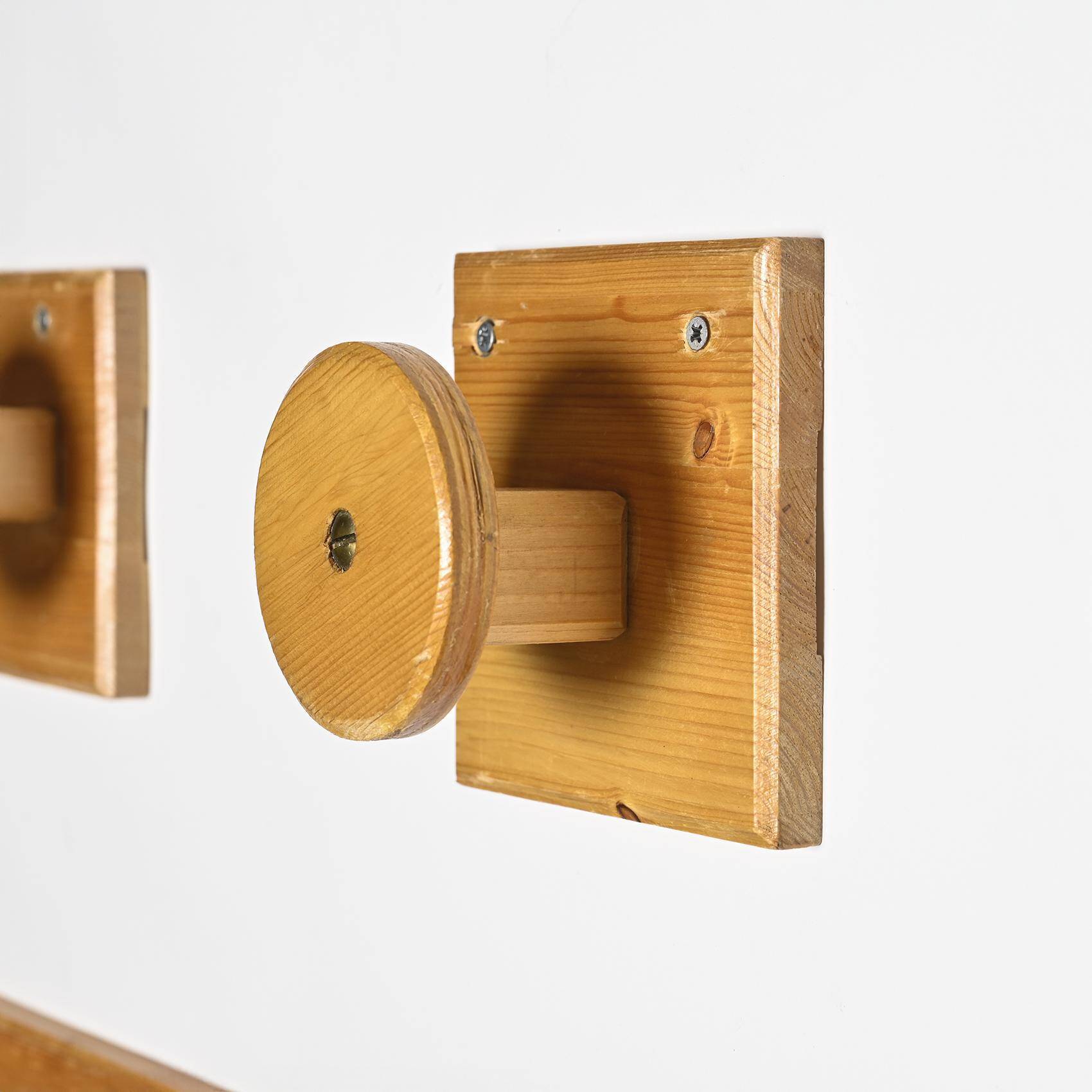 Set of solid pine wall hooks, France, circa 1970