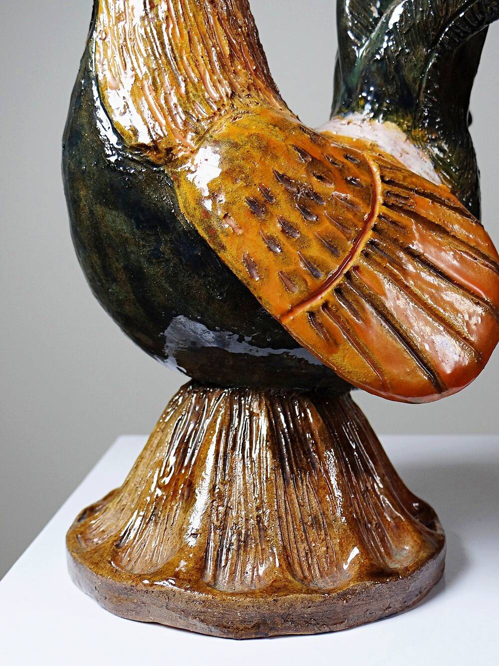 Small decorative rooster in handcrafted enameled ceramic folk art