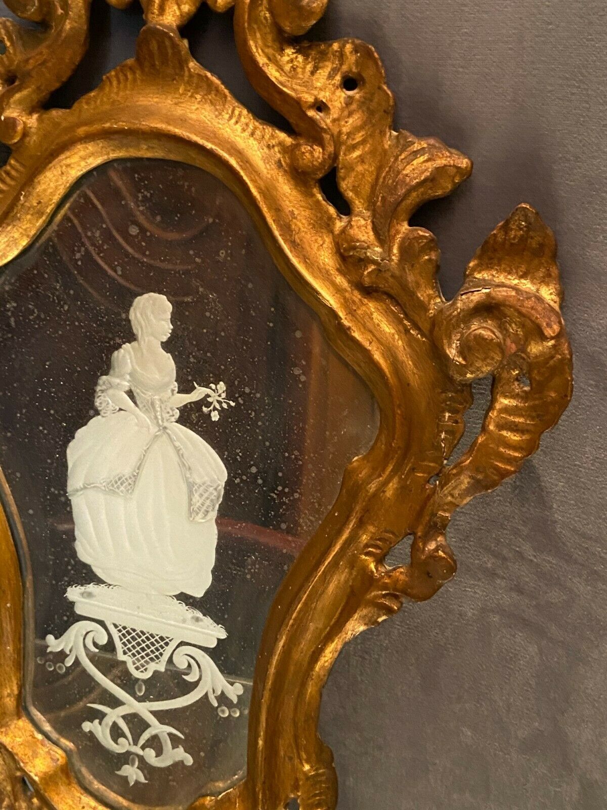 Mirror Rocaille Louis XV gilded wood decorated with a candle display depicting a lady Venice xixth