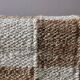 Checkered jute rug
