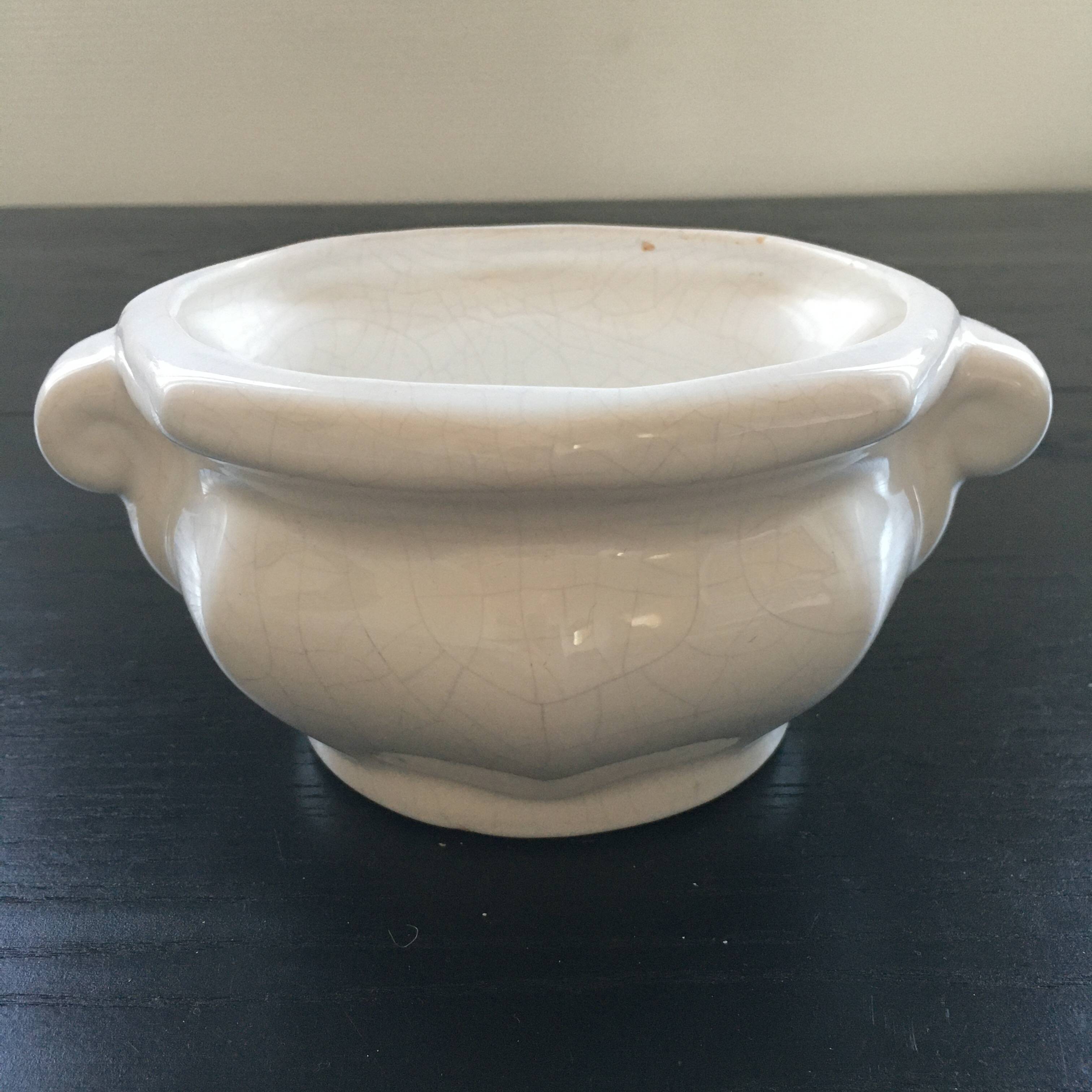 Cracked earthenware planter