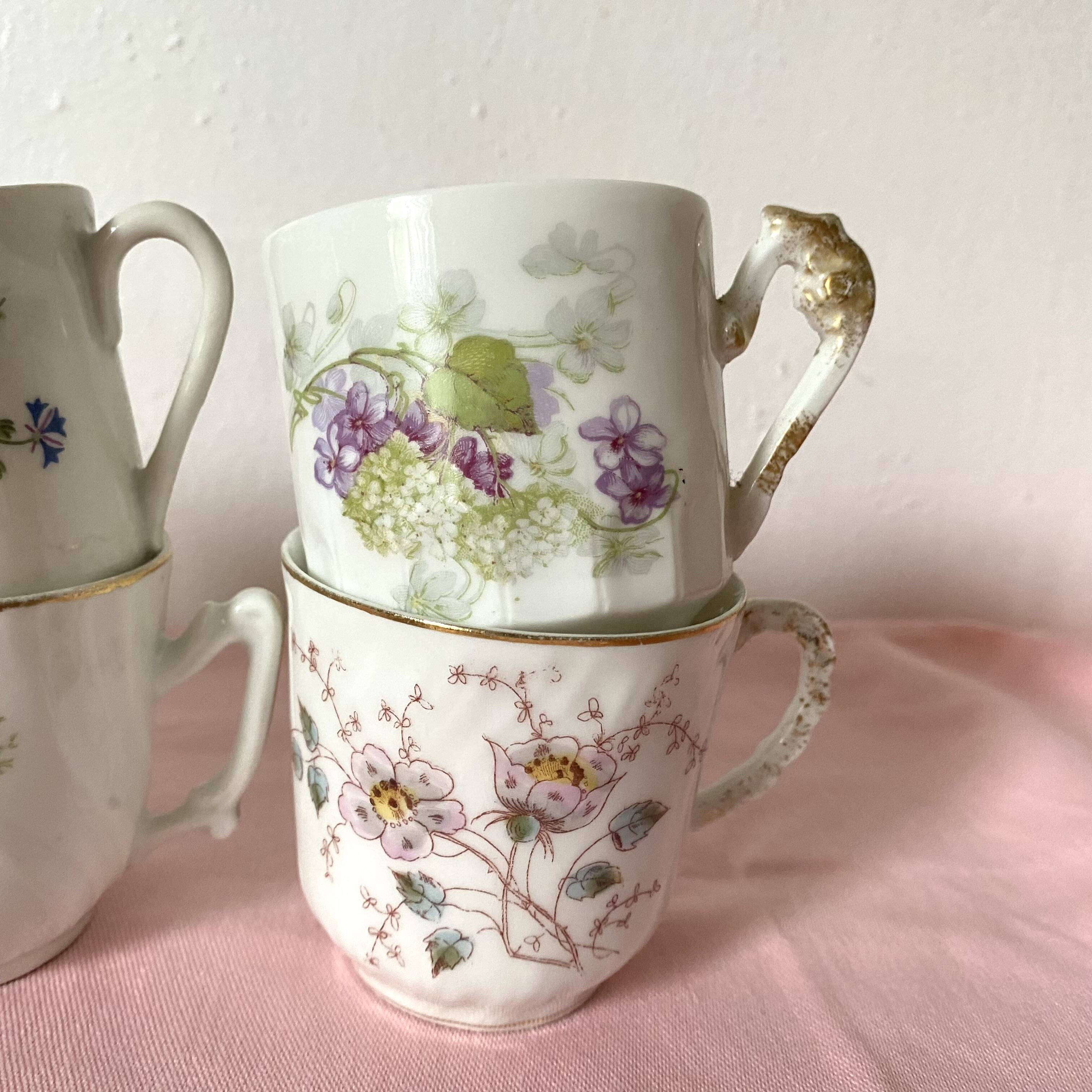 Old flowery coffee cups mismatched