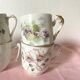 Old flowery coffee cups mismatched