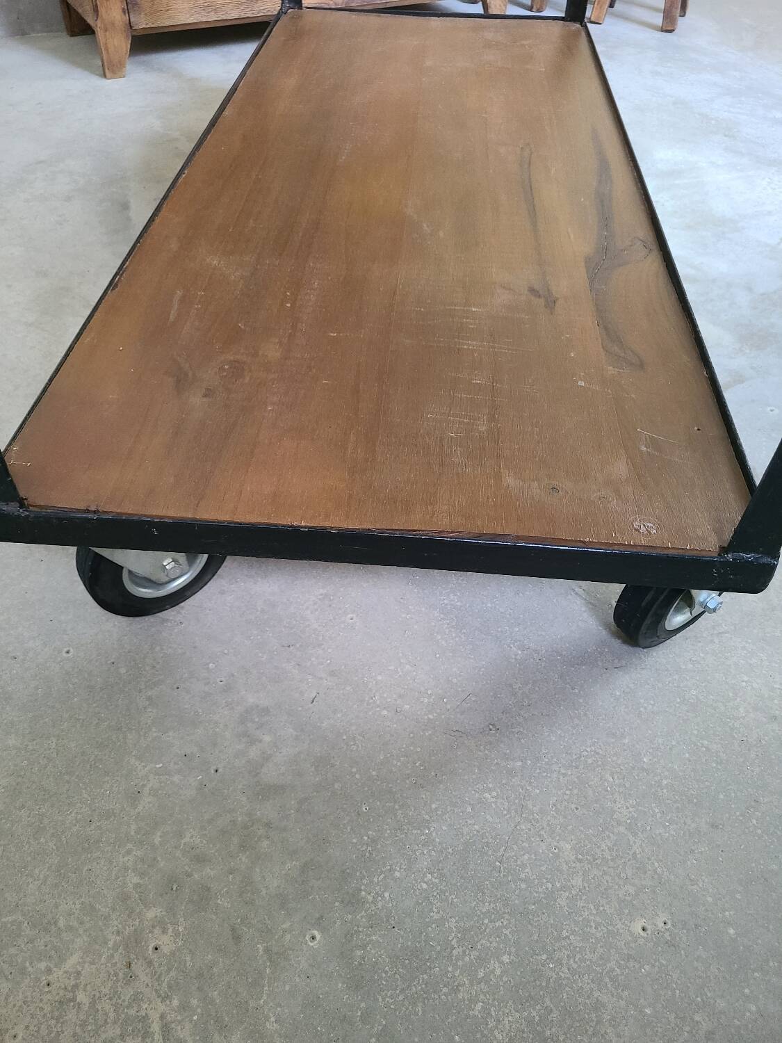 Large central kitchen island trolley on wheels serving industrial console