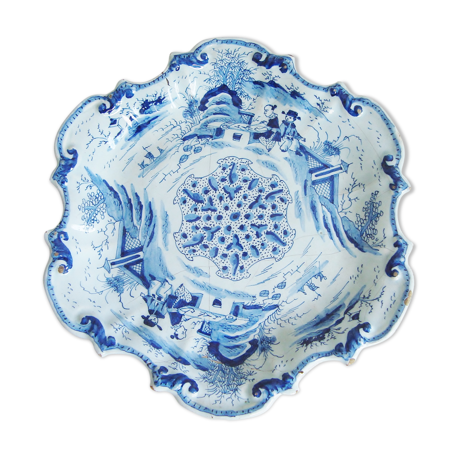 Old blue and white Delft decorative plate with Chinese motifs