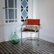 Vintage armchair in chrome and cognac leatherette