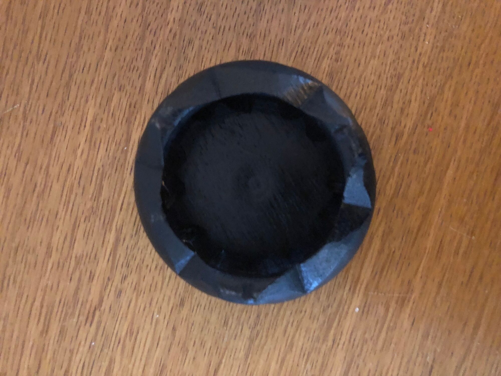 Chinese porcelain bowl on wooden base