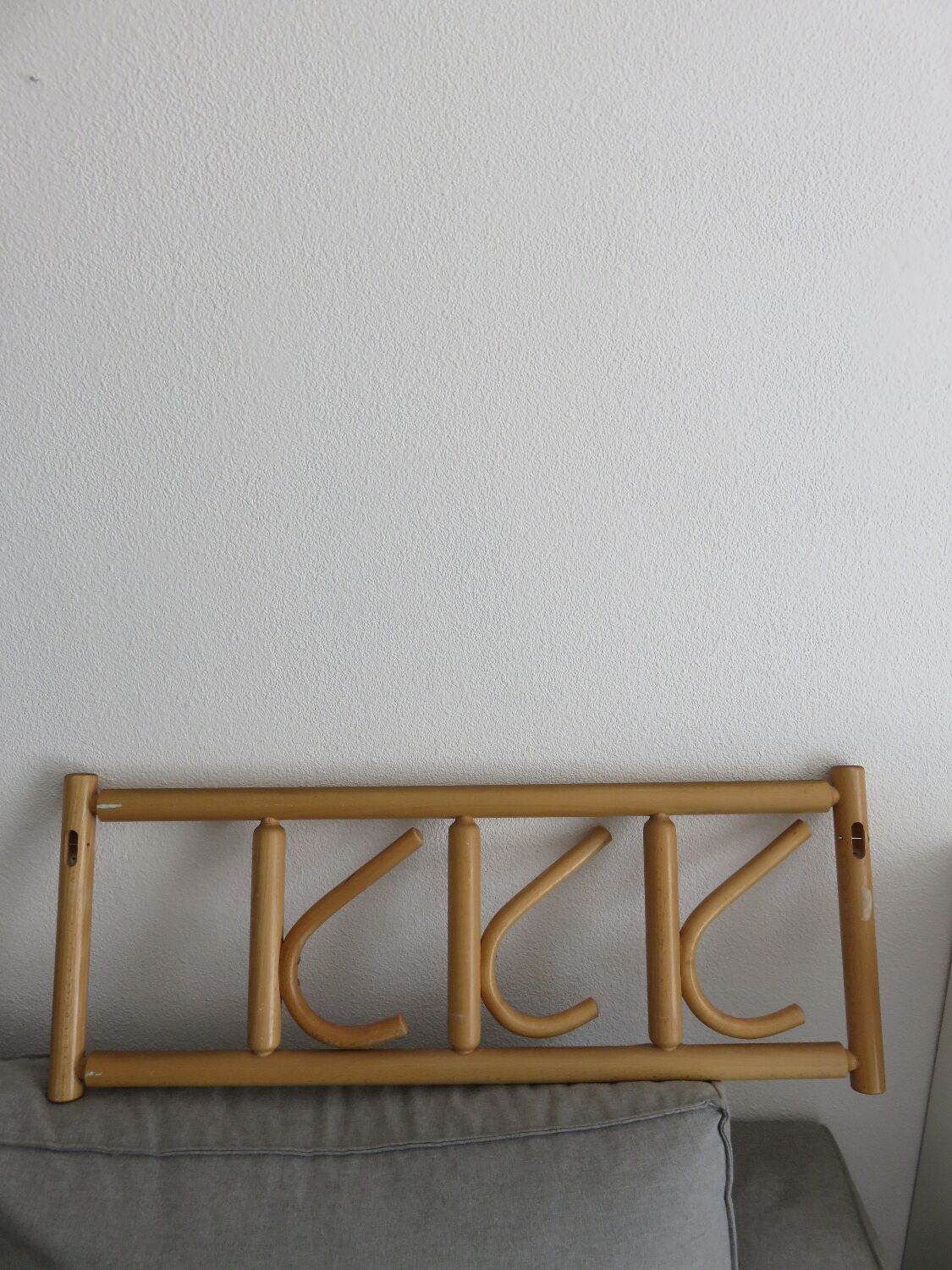 Curved wooden wall coat rack from the 70s-80s.